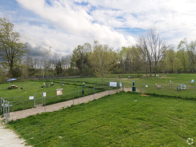 Lakeville's big dog park gives your pet lots of room to run and play safely in.