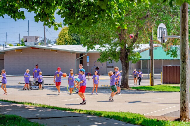 Youth gather and play basketball at the Martin Luther King Jr. Park.