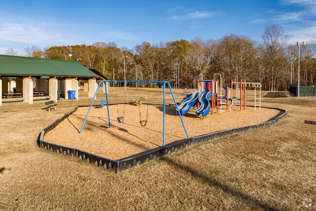 Kids of all ages love playing on the colorful playground at Swam Creek Park in Athens.