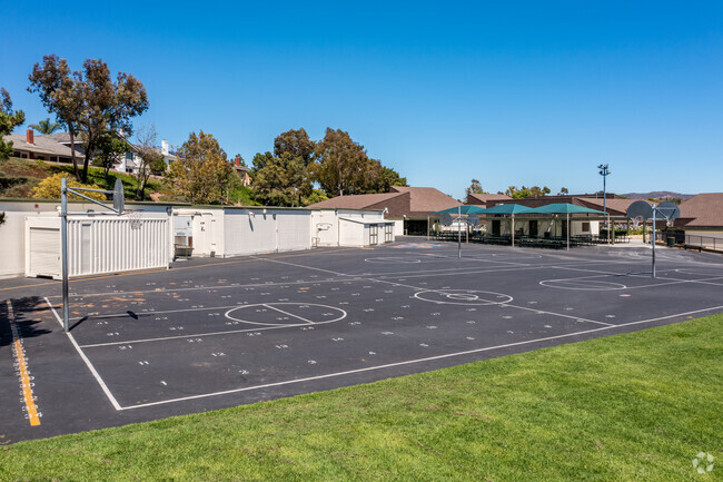 Basketball courts on the blacktop at Irvine's Bonita Canyon Elementary support physical wellness