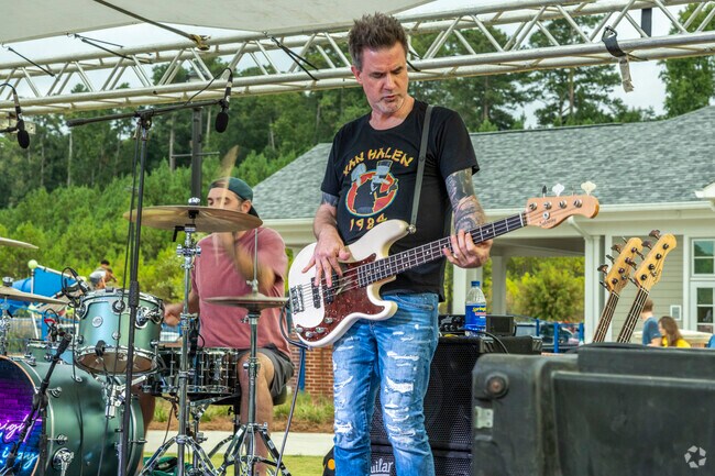 Evans Farmers Market sets up outside of the Performing Arts Center, selling local goods and featuring live music.