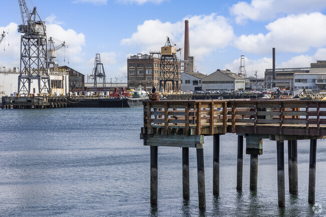 Dogpatch's fishing pier looks out onto the old steel production and cranes.