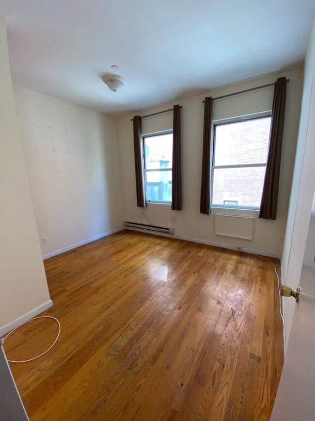 Bedroom 1 with two windows