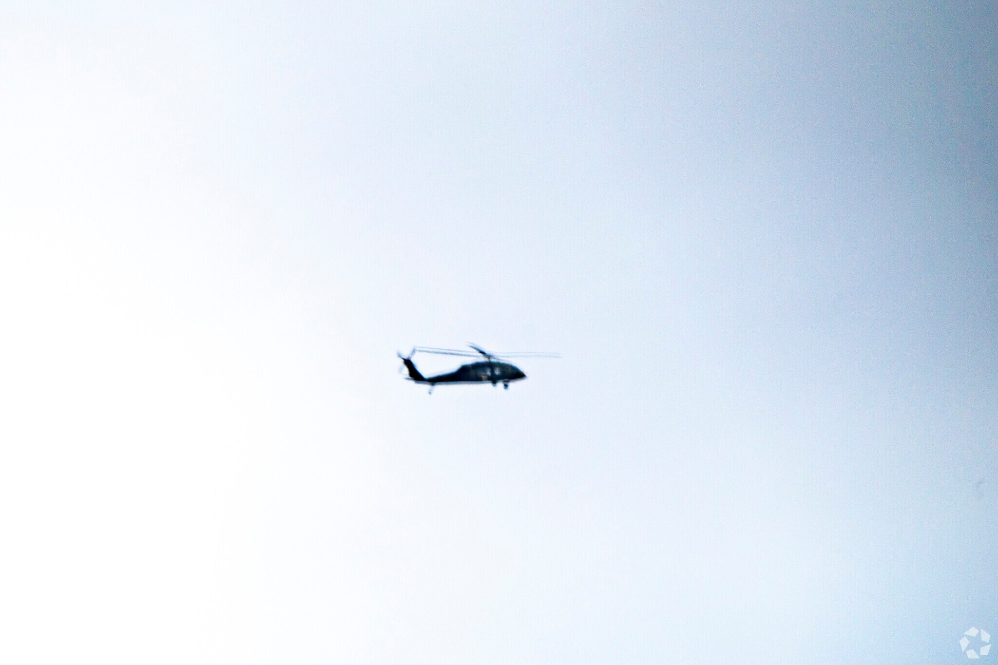 Military chopper overhead.