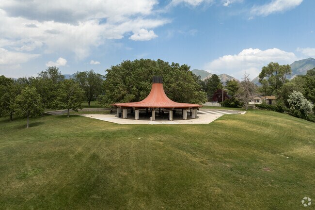 A hilltop pavilion overlooks open space at Big Cottonwood Regional Park.