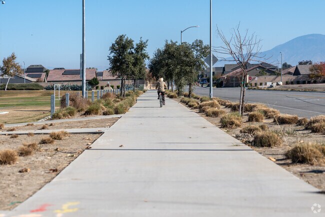 A man rides his bike around the Sports Village in Panama.