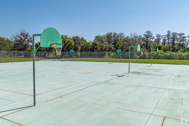 Kids enjoy outdoor play on the sports courts at Jennings Middle School.