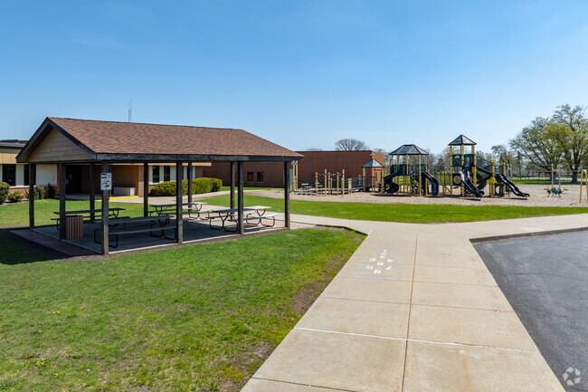 Morgan Township Elementary School covered picnic tables and playground.