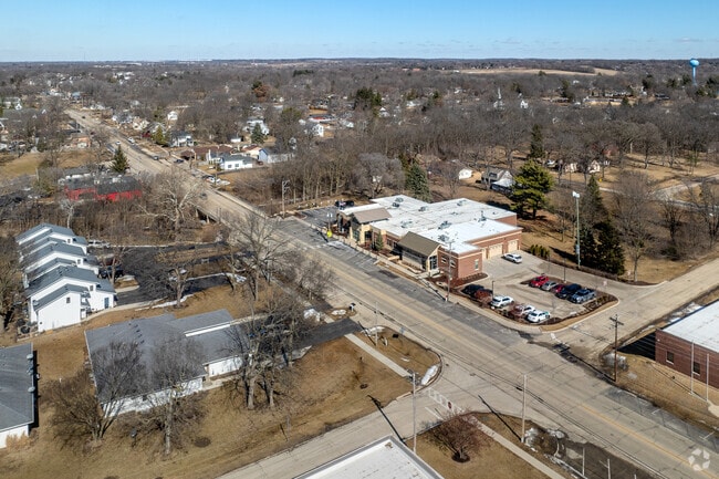 Small shopping centers sit beside churches and standalone bars along Main Street in Roscoe.