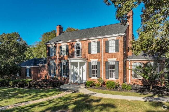 Classical estates tower over the streets of Ingleside Historic District.