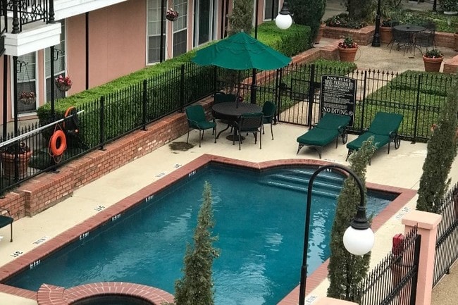 Inviting pool, hot tub and lounge chairs