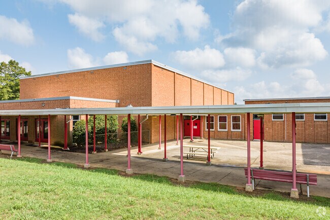 The Kearns Academy features a covered walkway for pick-ups and drop-offs.