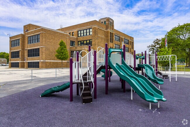 Students enjoy the playground at Burbank Elementary School in Johnson's Woods.