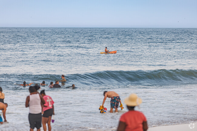 Paddle around in the surf at Rehoboth Beach.
