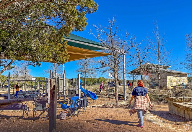 Many people take their children out to play at Blue Hole Regional Park.