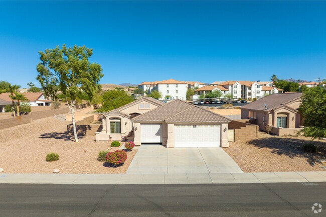 Indulge in the comfort of spacious homes at Desert Foothills Estates.