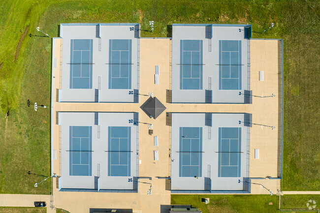 There are a lot of pickle ball courts at Eisenhower High School.