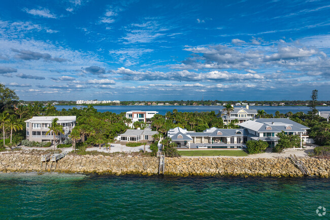 Palmer Point homes are built on large properties overlooking water on either side.