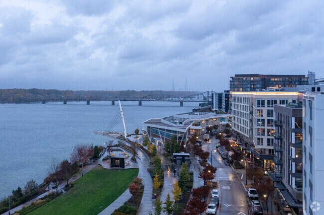 Chic new condos, eateries, and wine bars line the opposite side of Waterfront Way in Vancouver.