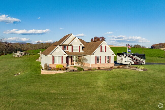 Wake up to the serenity of Windsor Township, where homes blend seamlessly with the panorama.