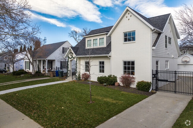 A row of traditional brick homes line this picturesque street in Yalecrest.