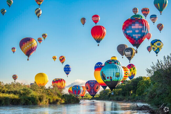 Each October hot air balloons fill the sky and dip into the Rio Grande near River's Edge.