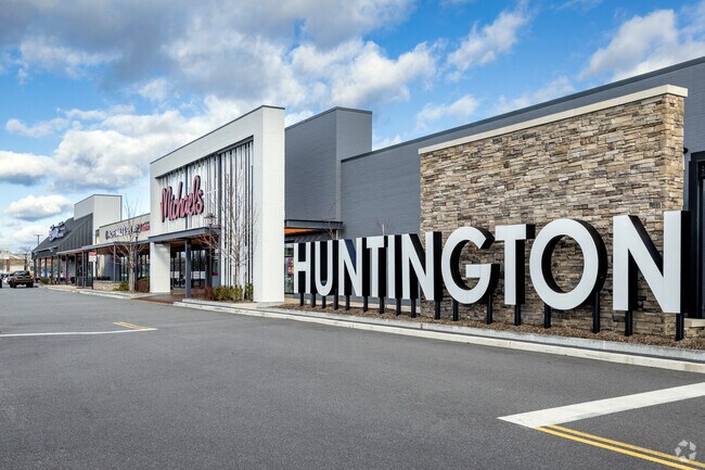 The iconic Huntington sign welcomes shoppers to the shopping center on Route 110 in South Huntington.