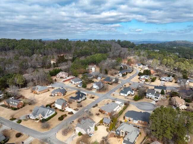 Nestled on the charming outskirts of Rome, GA, you'll find a delightful small subdivision of homes.