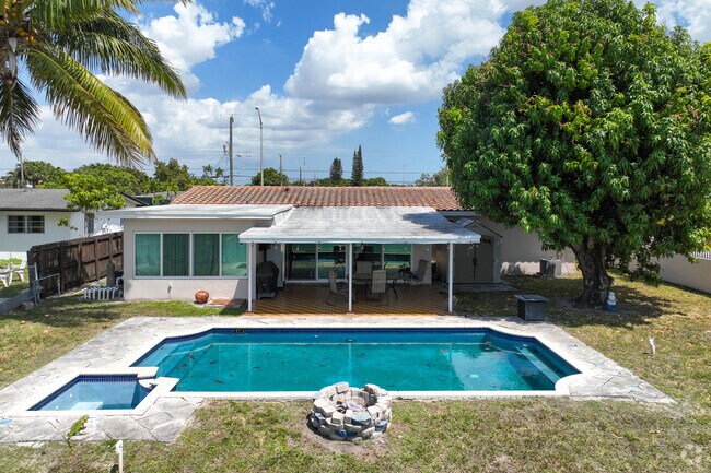 Minimal traditional house with pool in Palm Springs neighborhood in Hialeah.