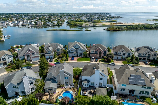 Homes line the south shore neighborhood of Seaford, with plenty of dock space for boats.