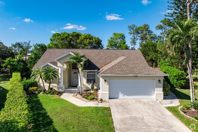 Briarwood homes are adorned with lush tropical landscaping and greenery.