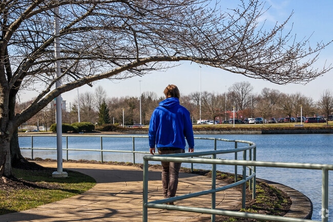 Locals love to get outside and walk the trail around the pond at Brandywine Town Center.