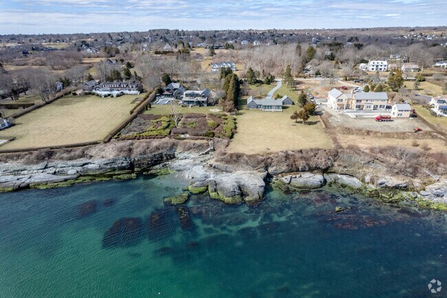 Waterfront Homes set atop granite cliffs are sure to show beautiful water views in the Whitehall neighborhood.