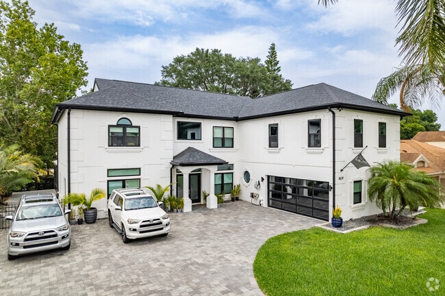 A large white custom contemporary home in MetroWest.