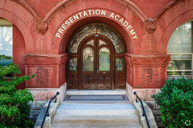 Entrance Shot shows the arched doors leading into Presentation Academy in Louisville, KY.