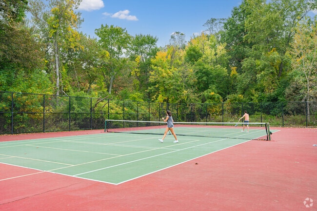 Locals resident enjoy playing tennis at Victory Park in the West Medford neighborhood.