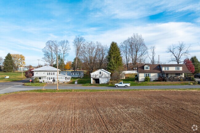 Single family homes in Mount Pleasant Columbia sit on open country roads.