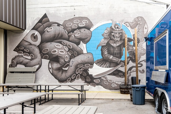 Mentelle features murals, sculptures, and other art installations.