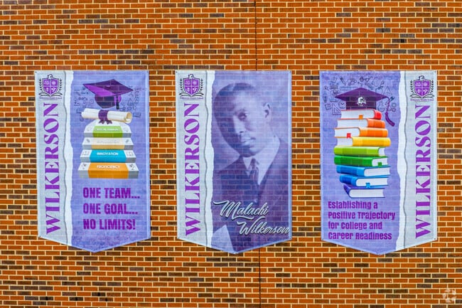 Wilkerson Middle School, located near Acipco-Finley, features a banner of the school's namesake, Malachi Wilkerson, near the front entrance.