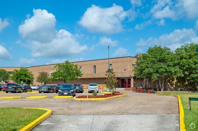 Einstein Sara Towles Reed High School serves grades 9–12 in New Orleans East.