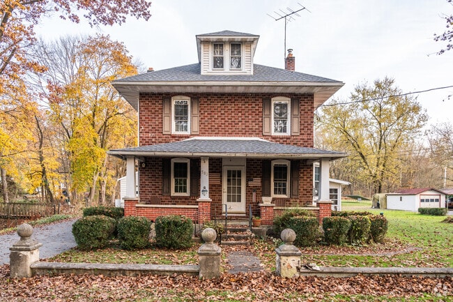 Perry Township's hidden gems homes that blend seamlessly into the natural beauty.