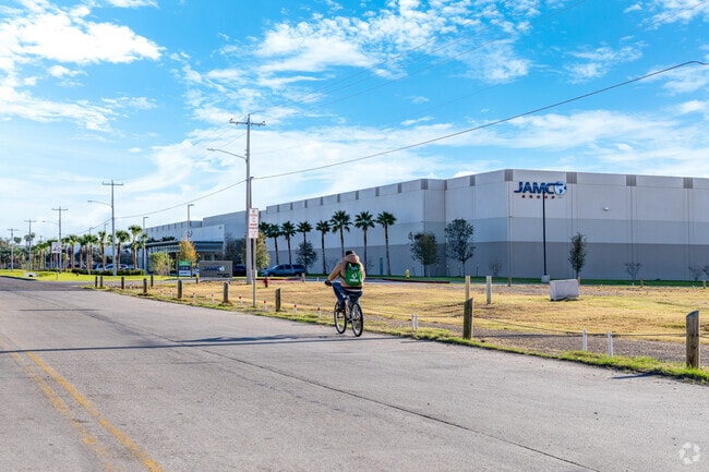 Residents of La Bota Ranch commute to work on bikes and in cars.