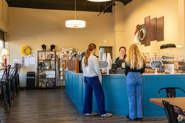 Warm lights and latte art set a friendly tone at The Corner Nook in Minden.