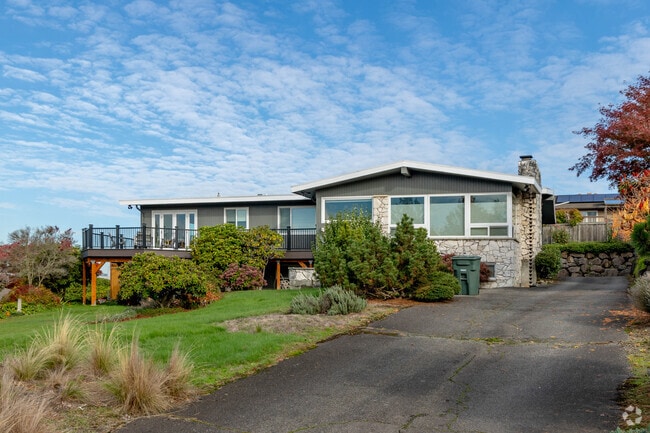 Woodridge split-level homes often include backyard decks for warm-weather lounging.