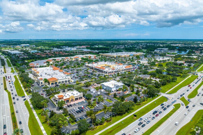 Aerial overview of Town Center at St Lucie West and its shops.