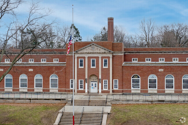 Benjamin Franklin's brick exterior is a solid symbol of timeless education in Old Brooklyn.