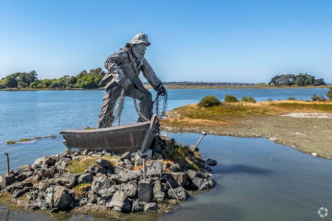 This statue just off the shore of Broadway Street is a sailor coming to shore in his dinghy.