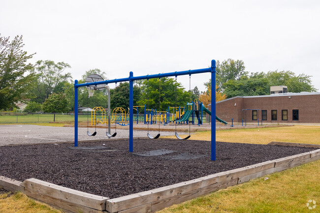 A swing set on the playground of Beulah Park Elementary School.