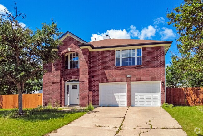 Many red-brick homes in Harris Branch featured gabled roofs.