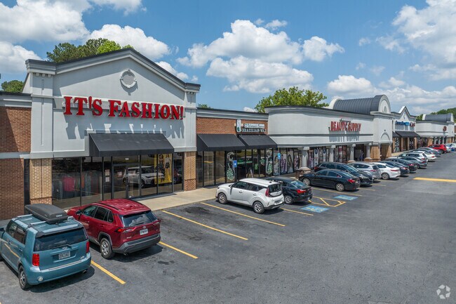 Victory residents enjoy convenient access to neighborhood retail hubs like this bustling plaza, anchored by local businesses and dining spots.